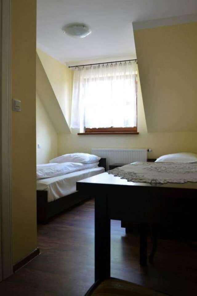 Отели типа «постель и завтрак» Pokoje Gościnne w Ratuszu Огродзенец-11
